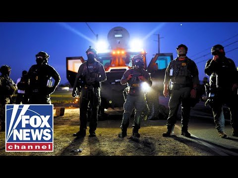 Trump orders agents to fight back 'using whatever means necessary' after raid