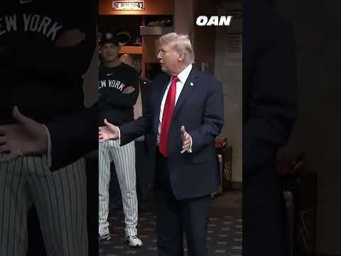 President Trump shakes hands with New York Yankees players inside the clubhouse
